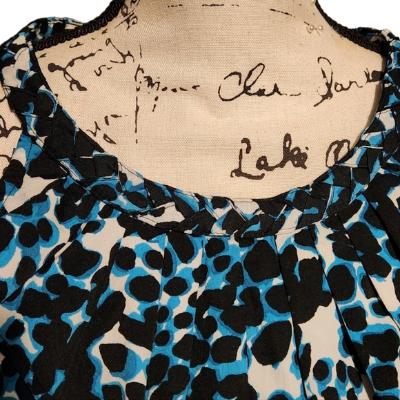 Animal Print Ruffle Sleeveless Blouse - Picture 3 of 5